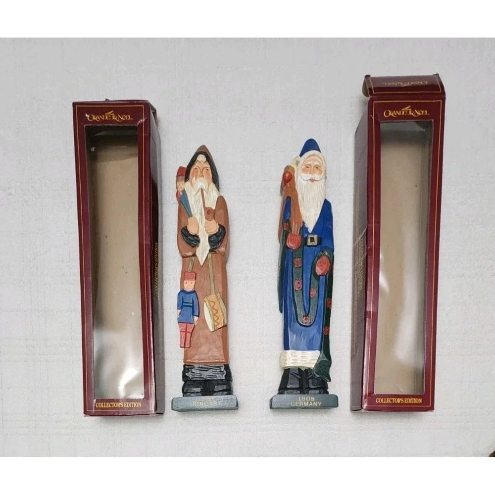 Grandeur Noel Collectors Edition Carved Wood Santa of the World Figures Set Of 2
